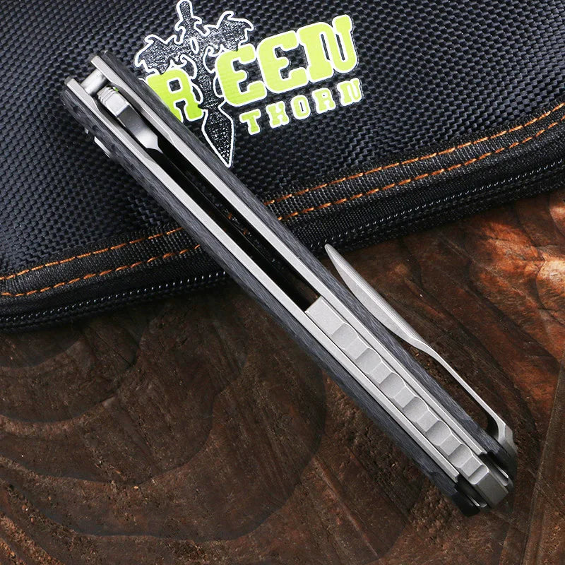 Green thorn f3ns k110 blade titanium + carbon fiber handle outdoor camping hunting practical fruit knife folding knife EDC tool。