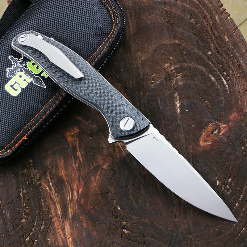 Green thorn f3ns k110 blade titanium + carbon fiber handle outdoor camping hunting practical fruit knife folding knife EDC tool。