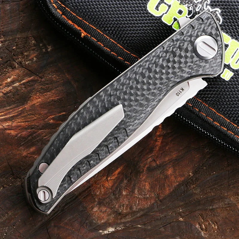 Green thorn f3ns k110 blade titanium + carbon fiber handle outdoor camping hunting practical fruit knife folding knife EDC tool。